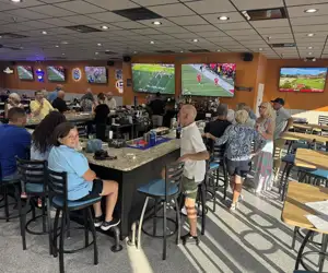 Guests enjoying an evening at the Salty Neighbor bar. 